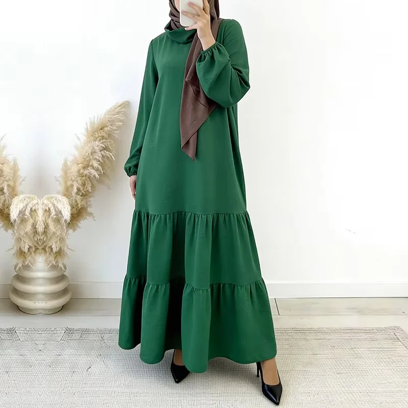 High‑neck long‑sleeve ruffle hem muslim long dress, soft flowing fabric, custom size available. Modest loose fit for Saudi Dubai