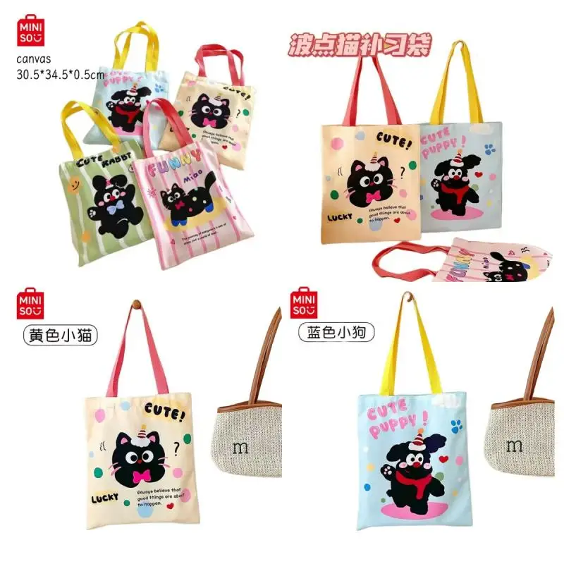 MINISO cartoon Instagram style cute polka dot cat student canvas tutorial bag simple handheld shoulder bag girl holiday gift