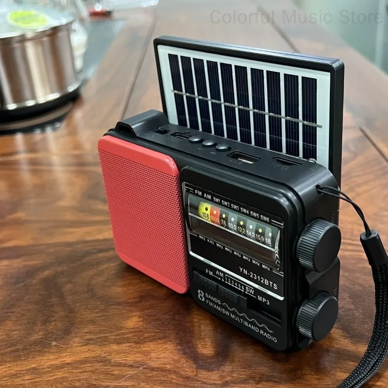 ミニポータブルFM AM SWラジオソーラー充電緊急ラジオワイヤレスBluetoothスピーカーMP3音楽プレーヤーTFカードUディスク対応