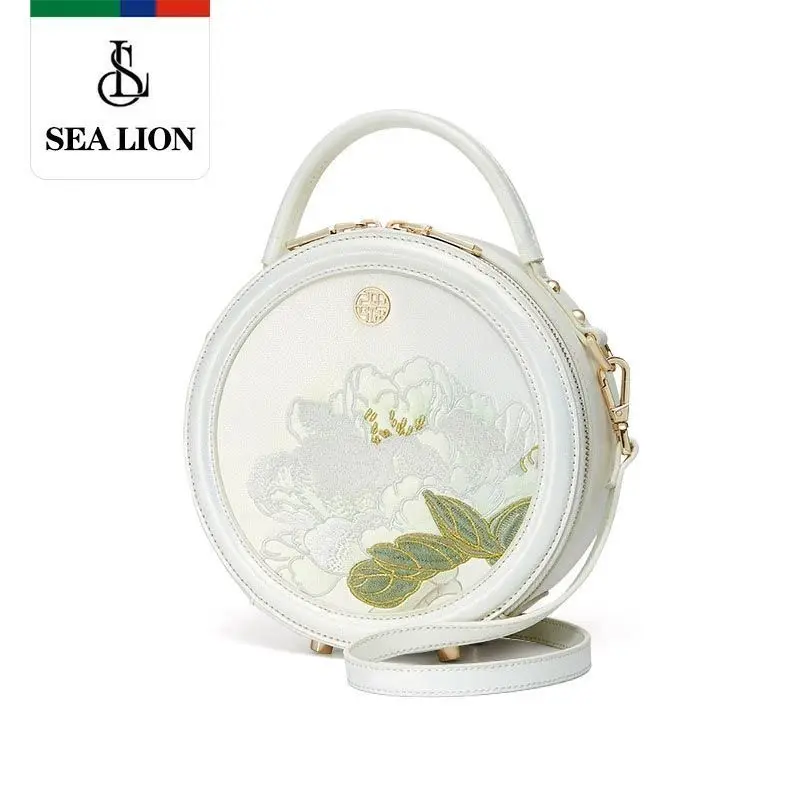 New white cheongsam embroidered with water reflecting hibiscus hand bill of lading shoulder slung new Chinese small round bag.