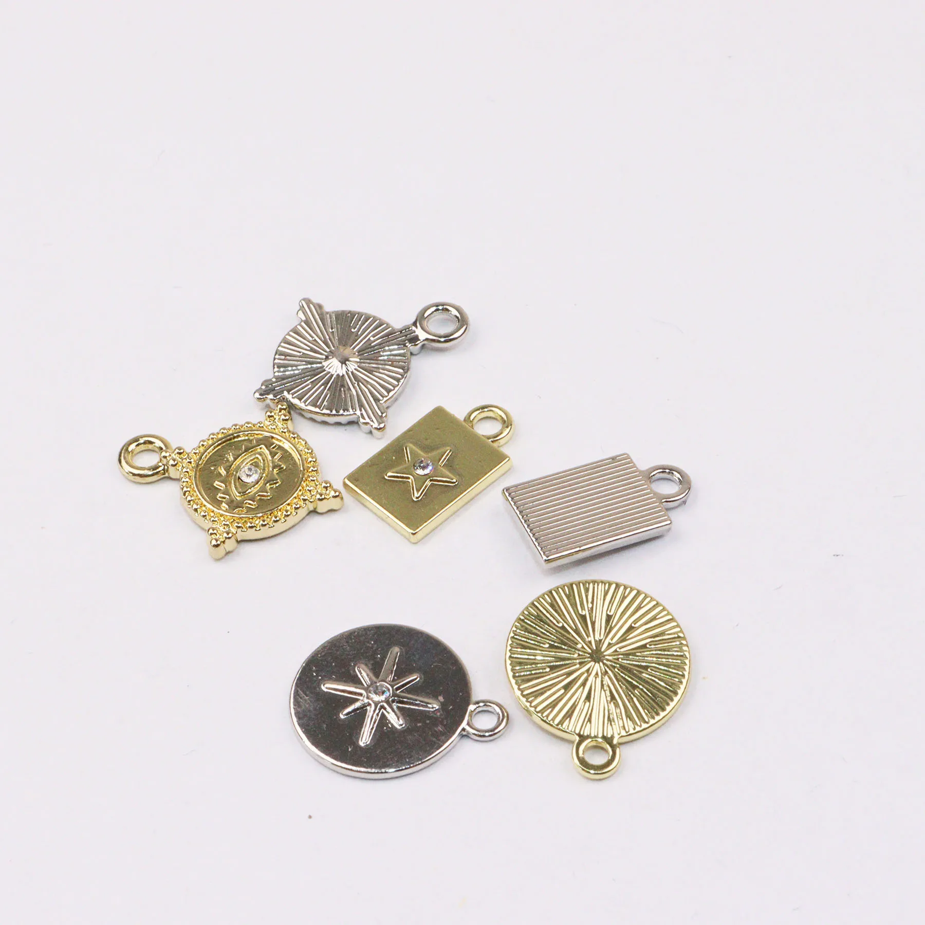 Eruifa 10 قطع نجمة مع حجر الراين عملة سبائك الزنك قلادة، القرط سوار مجوهرات DIY اليدوية 2 الألوان