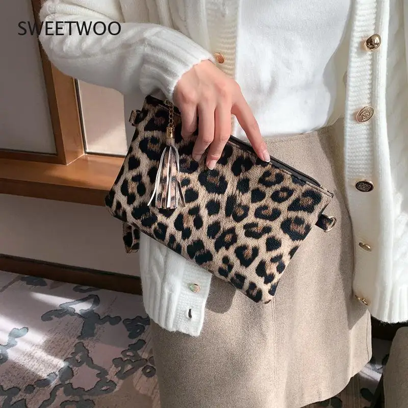 Borsa da polso geometrica con stampa di mucca leopardata in pelle PU borsa portaoggetti per telefono cellulare con moneta pochette da pranzo da donna