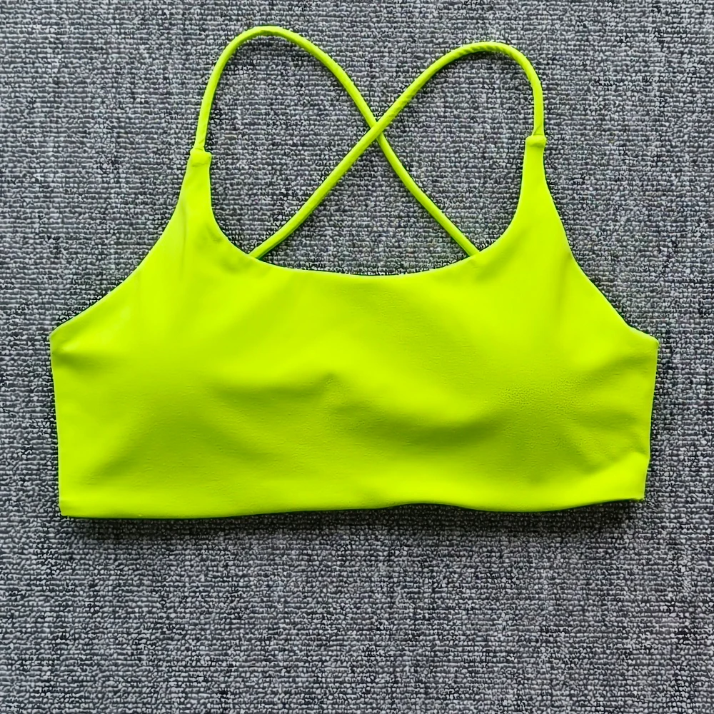 ﻿ Solide Colorsexy Zachte Vrouwen Fitness Sportbeha Top Gym Yoga Ondergoed Cross Back Cutout Atletische Strakke Training Met Borstkussen