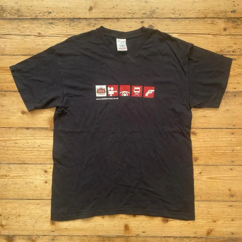 Screen Stars Vintage 90S Stella Artois camiseta gráfica negra