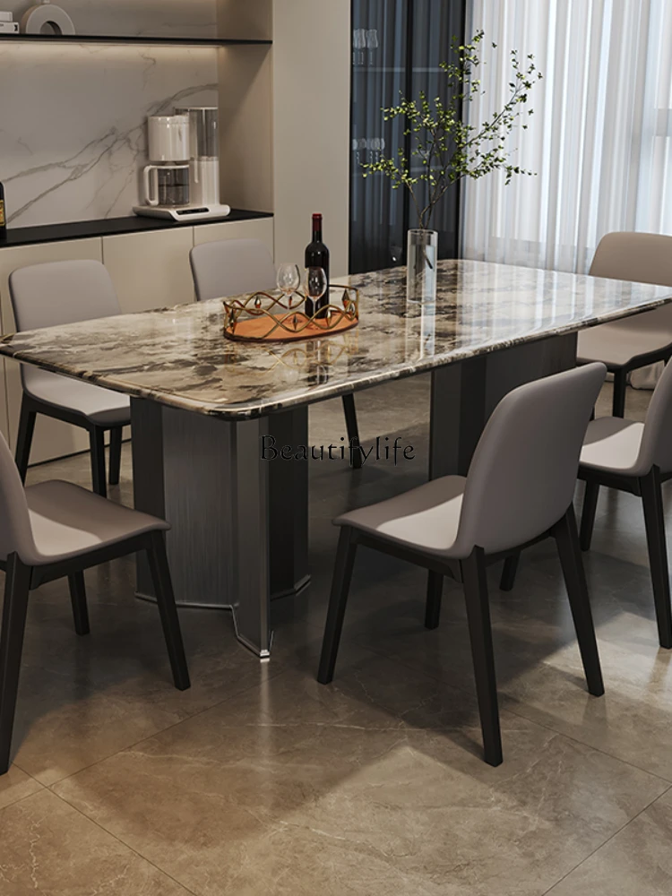 -*イタリアの軽い高級大理石のダイニングテーブル、モダンでシンプルな家