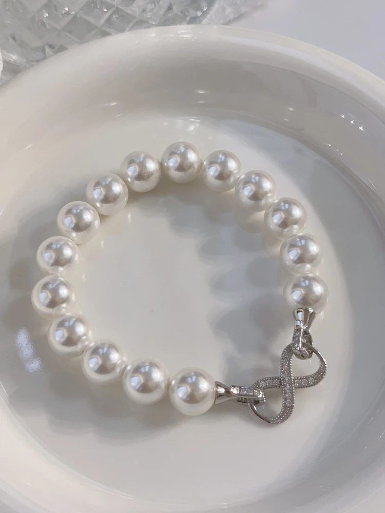 nuovo-bracciale-2025-in-argento-925-con-perle-australiane-bianche-da-donna-con-otto-bottoni-rotondi-micro-pave-gioiello-di-lusso-alla-moda
