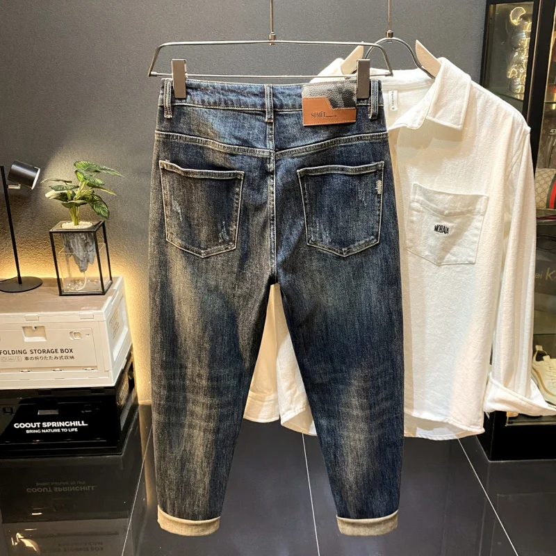 Tendência high-end 2025 outono novo rasgado remendado jeans magros masculinos na moda e bonito ruas casuais calças compridas