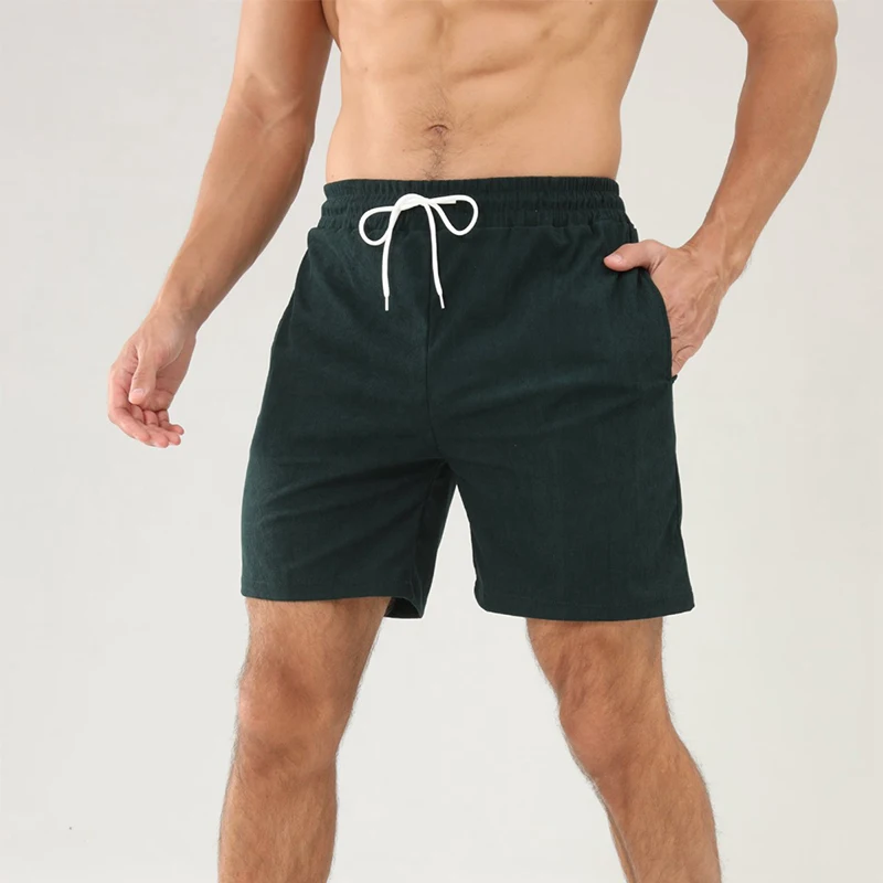 02Men's summer casual shorts featuring a solid color design with lace-up closure, sport running stripes, and straight-leg fit.