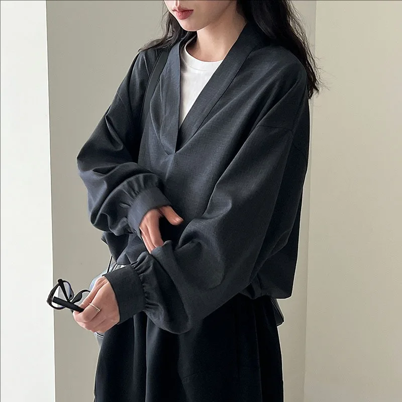 

Autumn casual new long sleeve V-neck loose shirt women clothing 2025