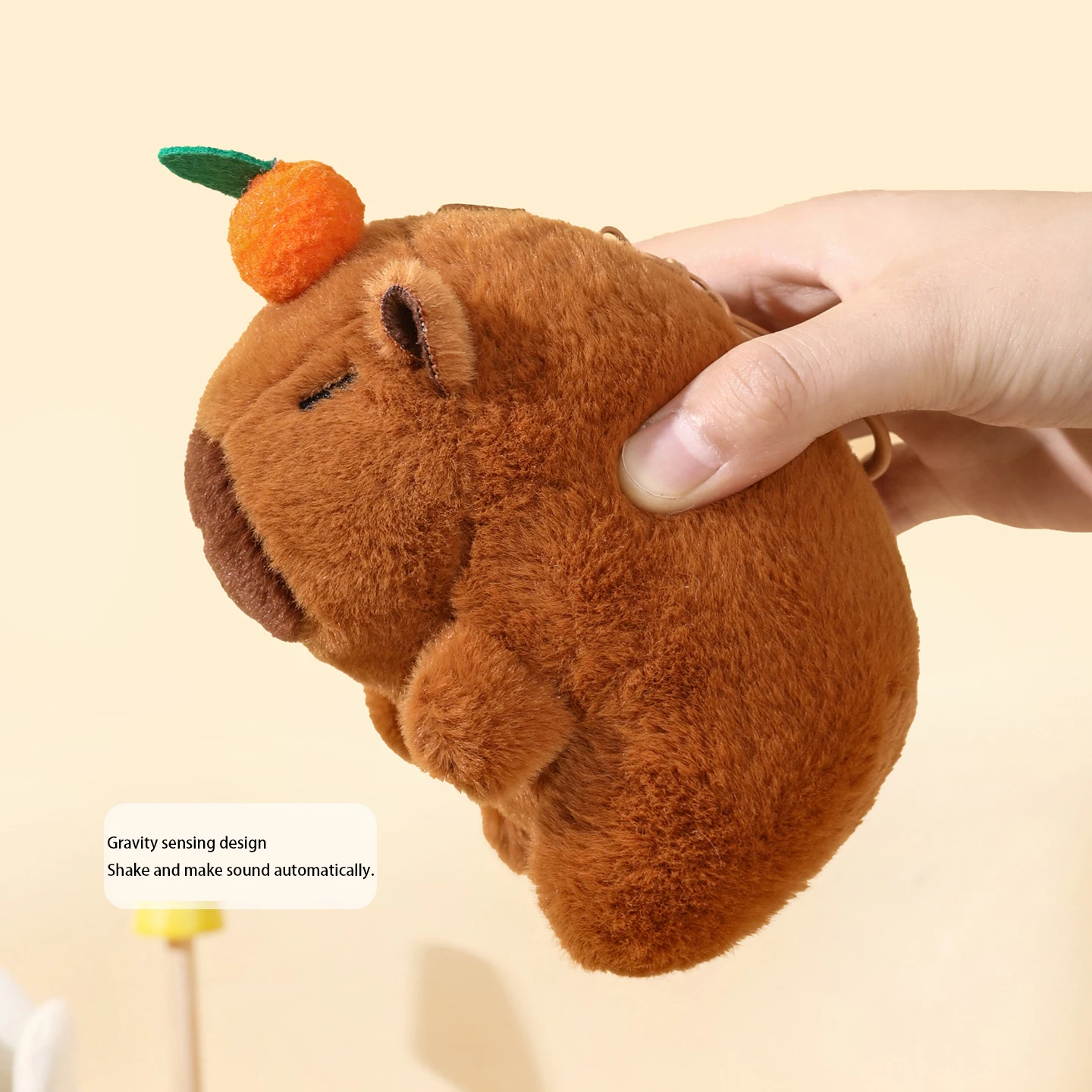 Urocza pluszowa zabawka wydra rzeczna dla niemowląt, antystresowa, dmuchająca bańki, potrząsająca się i wydająca dźwięki, zawieszka do kluczy na przyjęcie urodzinowe.