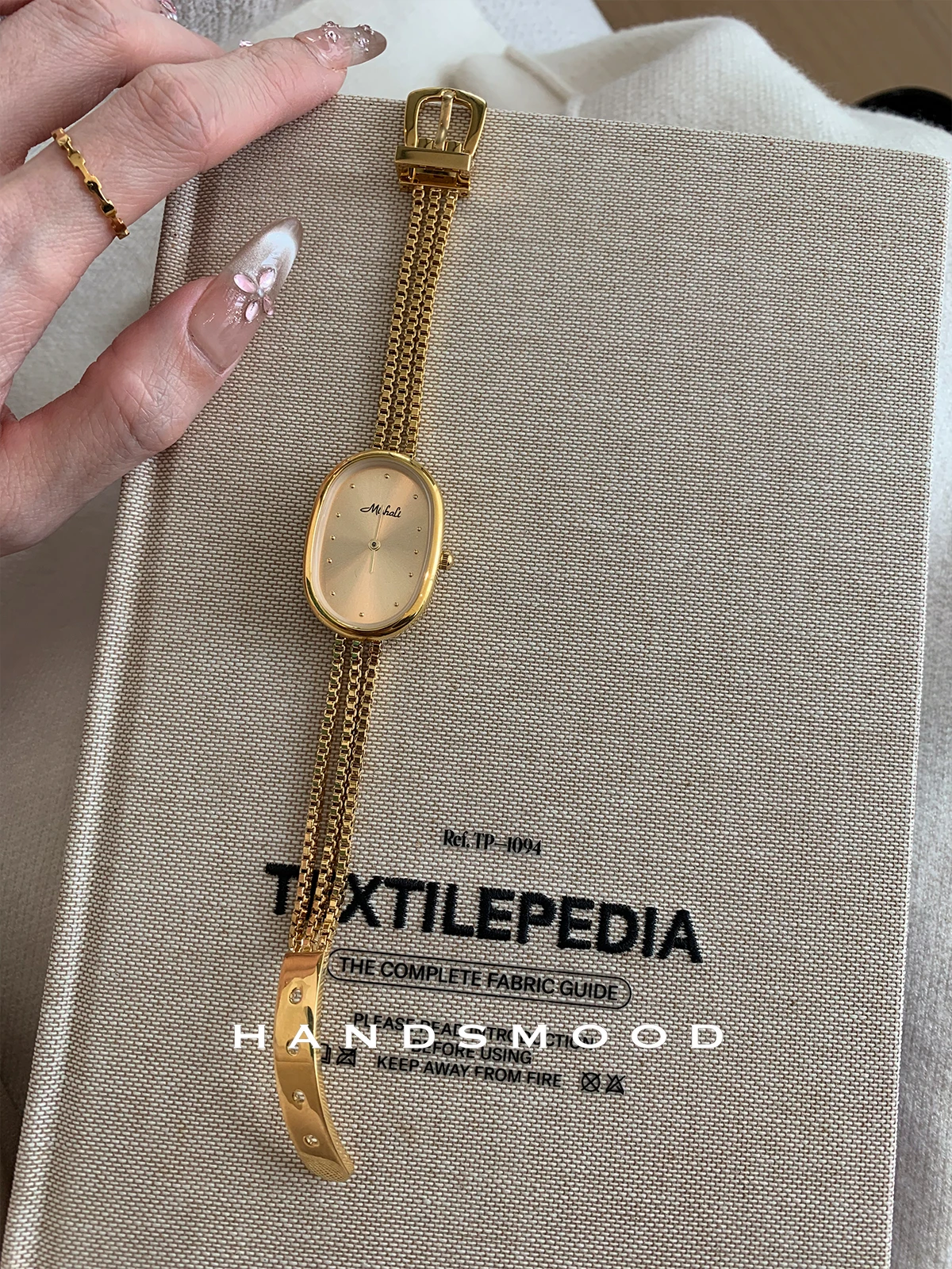 Luxury women's watch, high-end gold oval dial, tassel chain design belt buckle, ladies quartz watch, women's gift, women's watch