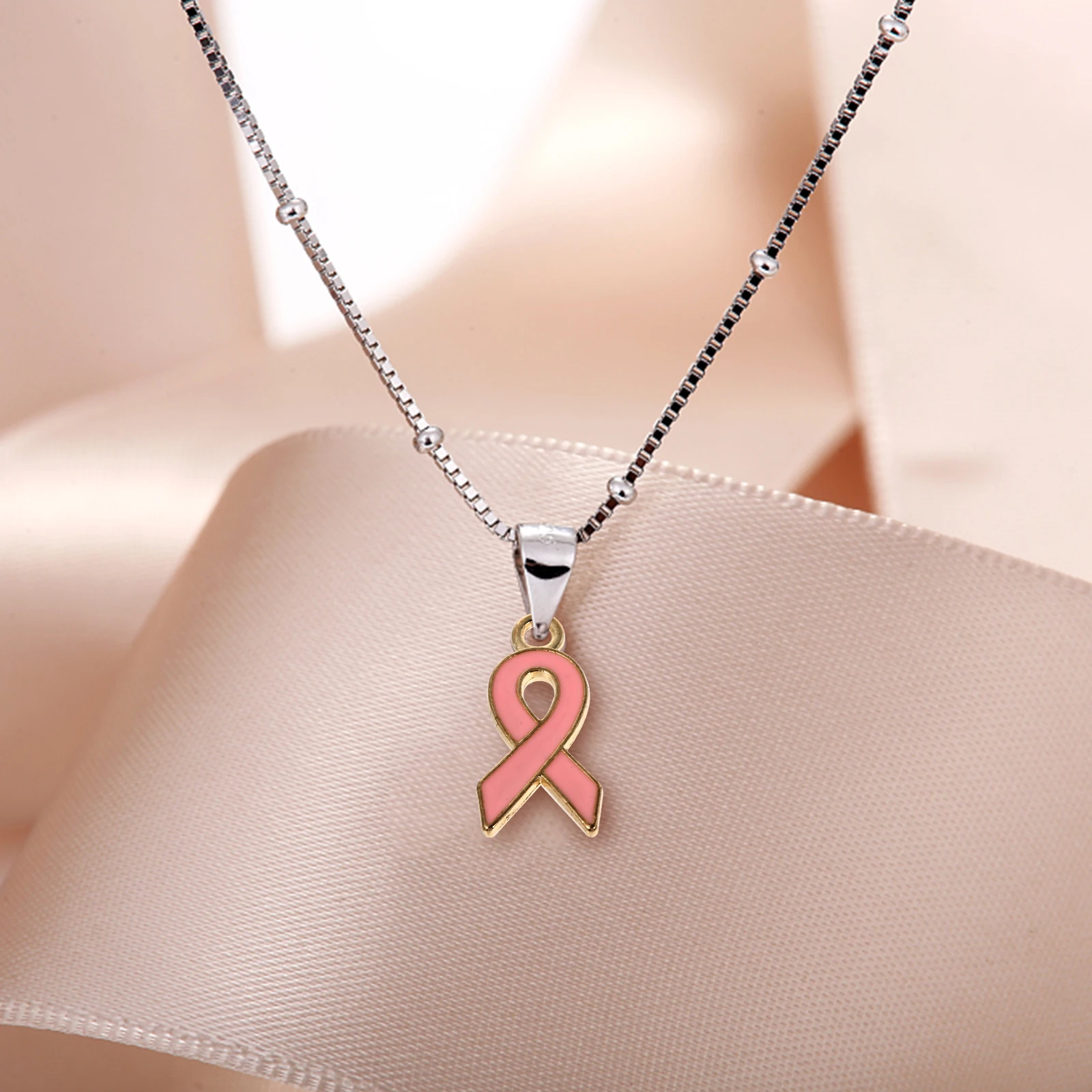 

120Pcs Pink Ribbon Charms Enamel Ribbon Beads for DIY Necklace Bracelet Jewelry Findings Dripping Oil Design Women Jewelry Beads