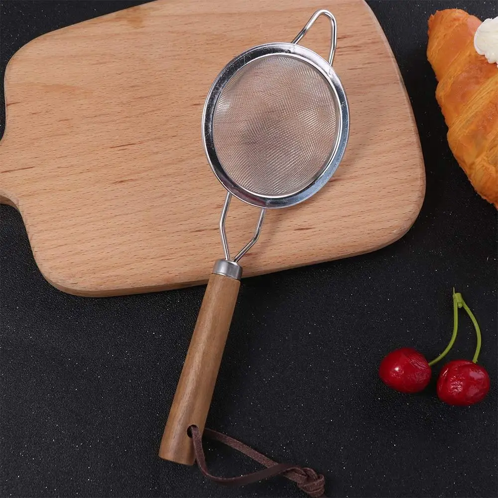 

Small Strainer Colander 304 Stainless Steel Wire Fine Mesh Juice Tea Strainer Wooden Handle Durable Fishing Spoon Household