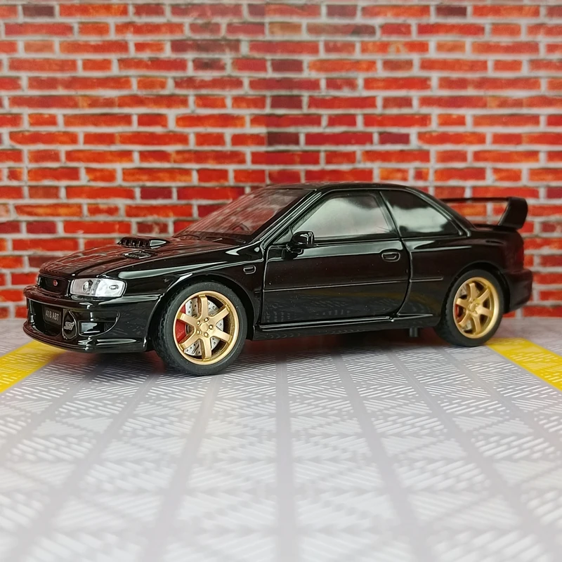 

1:32 Subaru WRXSTI alloy sports car model acousto-optic steering children's toy door and hood trunk can be opened good quality