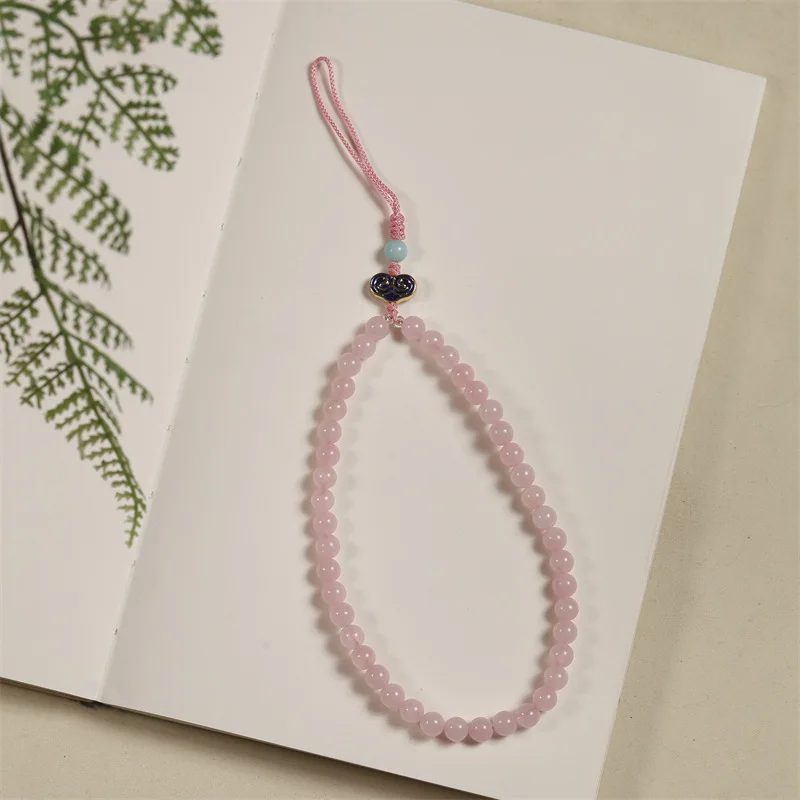 

Ремешок для мобильного телефона Натуральный камень Розовый кристалл Ручная работа из бисера Короткая цепочка для телефона Lucky Bag Подвеска Маленький розовый ремешок на запястье