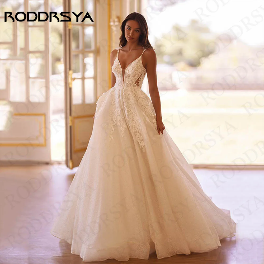 فساتين زفاف RODDRSYA خط للعروس خمر الخامس الرقبة السباغيتي الأشرطة vestido de novia الرباط سباركلي تول ثوب العروس سلسلة الزفاف الرجعية الخامس الرقبة السباغيتي الأشرطة فيستيدو دي نوفيا 2024 فستان الزفاف الدانتيل