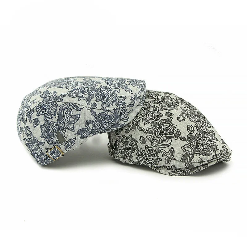 2025 أربعة مواسم البوليستر طباعة موزع الصحف قبعات الرجال قبعة مسطحة النساء الرسام قبعات بيريه 78