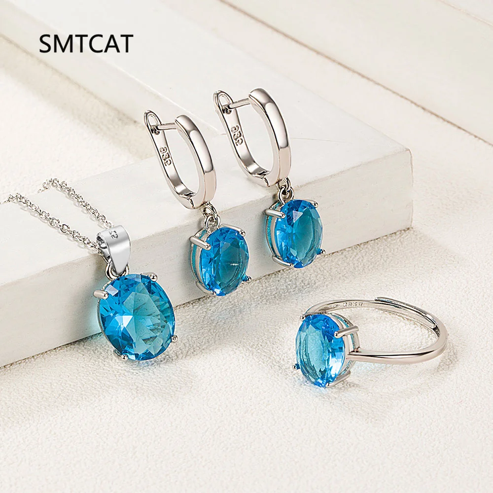 

Овальный натуральный синий топаз, комплект ювелирных изделий из стерлингового серебра 925 пробы, ожерелье + серьги + кольцо для женщин, эффектные ювелирные изделия с драгоценными камнями, бижутерия
