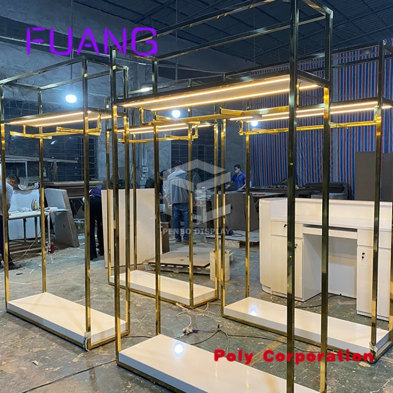 Custom  Modern Style Golden Stainless Steel Garment Clothing Display Racks Standing For Clothes Store