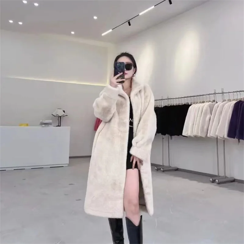 2025 Design Sense nuevo abrigo de piel sintética chaqueta de piel integrada para mujer cortavientos peludo suave grueso de longitud media prendas de vestir exteriores