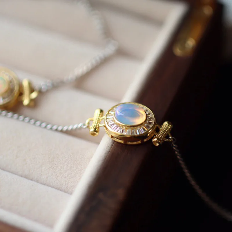 

Браслет из натурального опала, покрытый серебром 925 пробы с позолотой 18 карат, основной камень 6x8 мм, хорошее качество