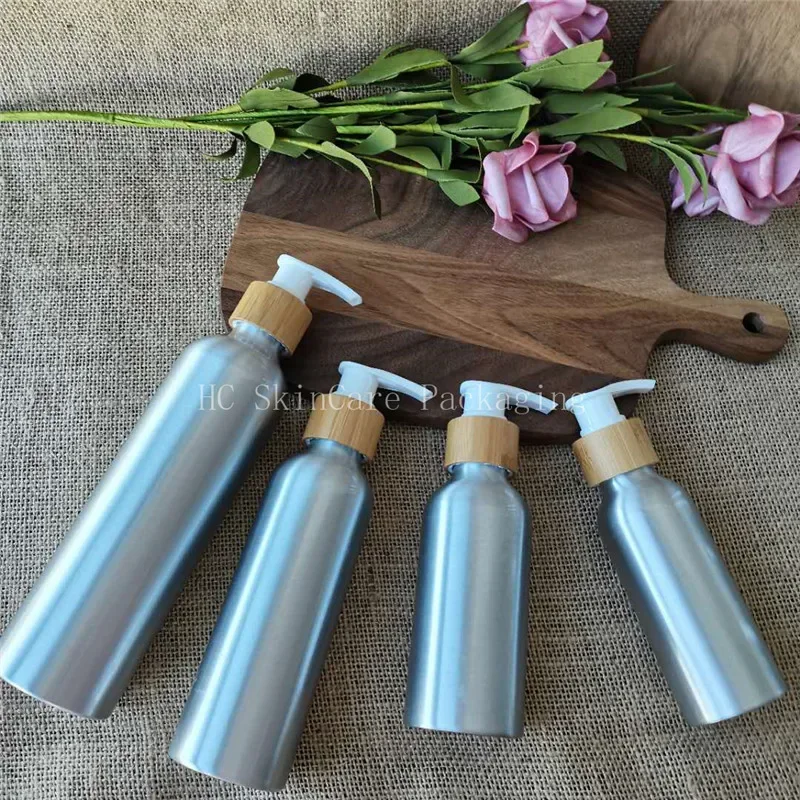 

selling popular pesonal Aluminum Bottle with Bamboo Lotion Pump Cap Shampoo lotion and Conditioner Refillable reacycle Bottles