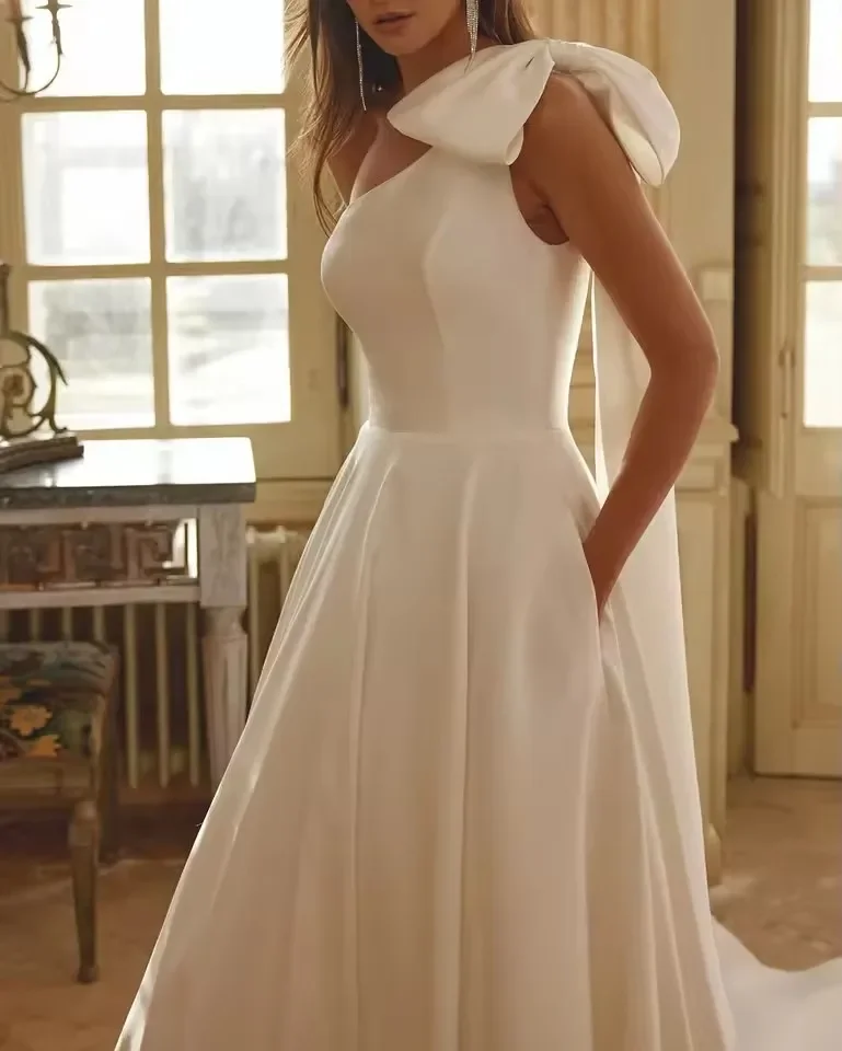 エレガントなワンショルダーサテンのウェディングドレス大きなリボン A ラインプリンセスブライダルドレスベストウェディングボールドレスカスタマイズ