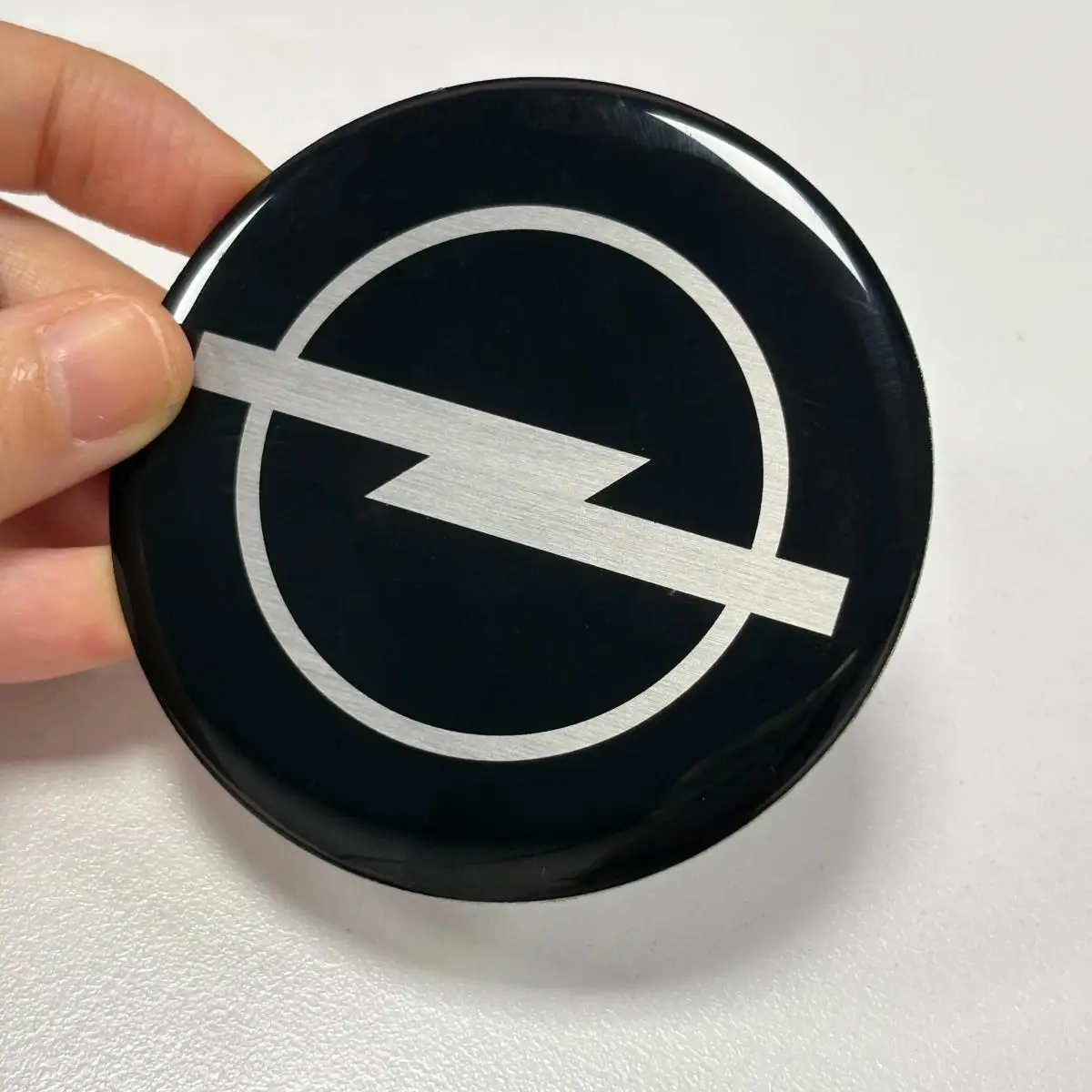 Emblema metálico Opel 70mm 73mm Topo Plano. Calibra, Cavalier, Astra GSI