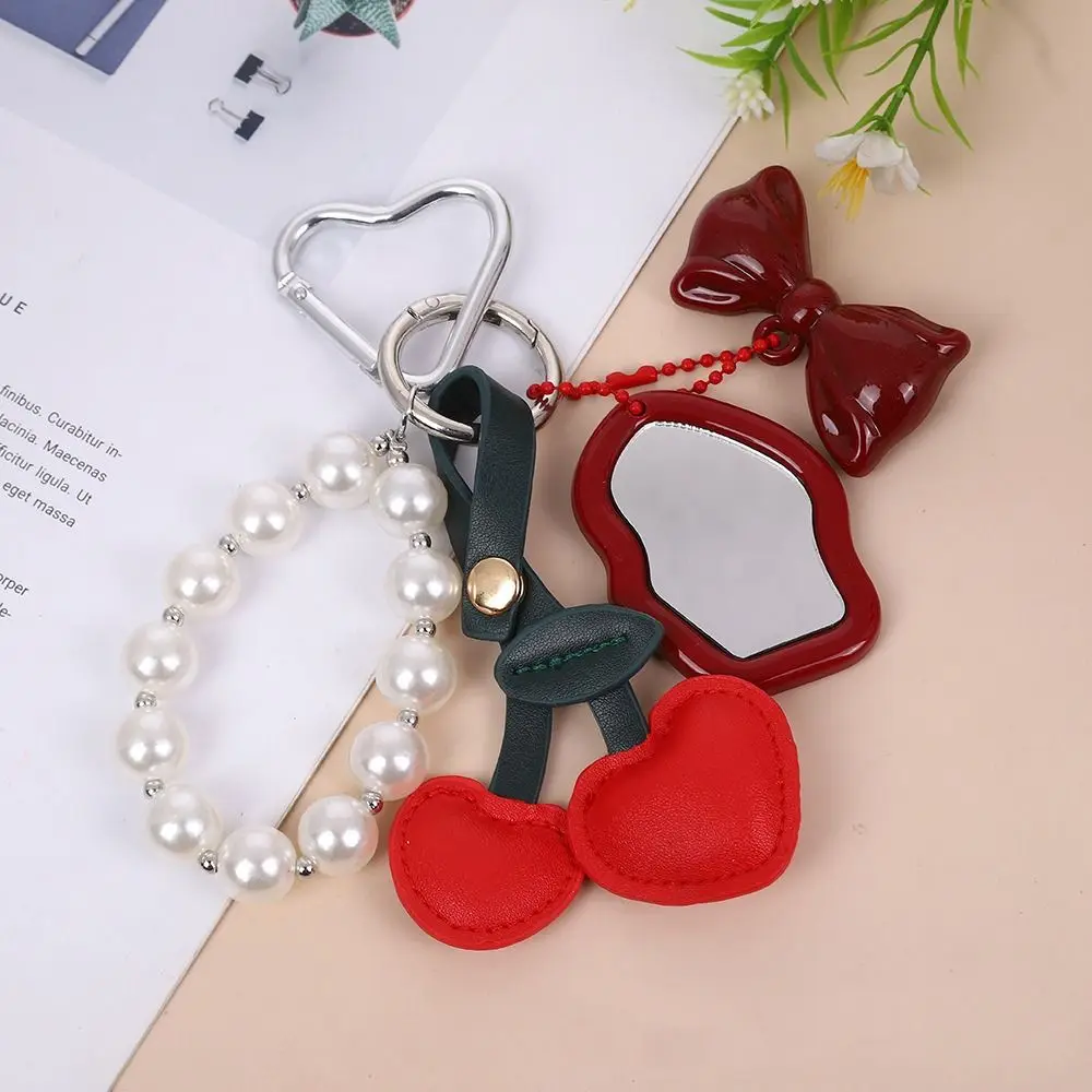 พีชหัวใจเชอร์รี่จี้ Key CHAIN Bowknot กระจกขนาดเล็กกระเป๋าจี้ PU หนัง Pearl CHAIN กุญแจรถกระเป๋าตกแต่ง