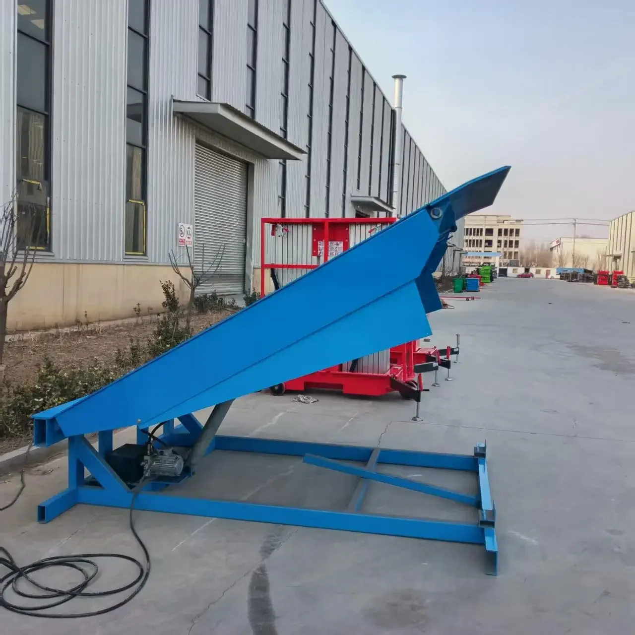 DCQG-6/8/10/12 TON Material manejo elevación tirando posicionamiento mesas elevadoras gran oferta puente de embarque fijo a buen precio