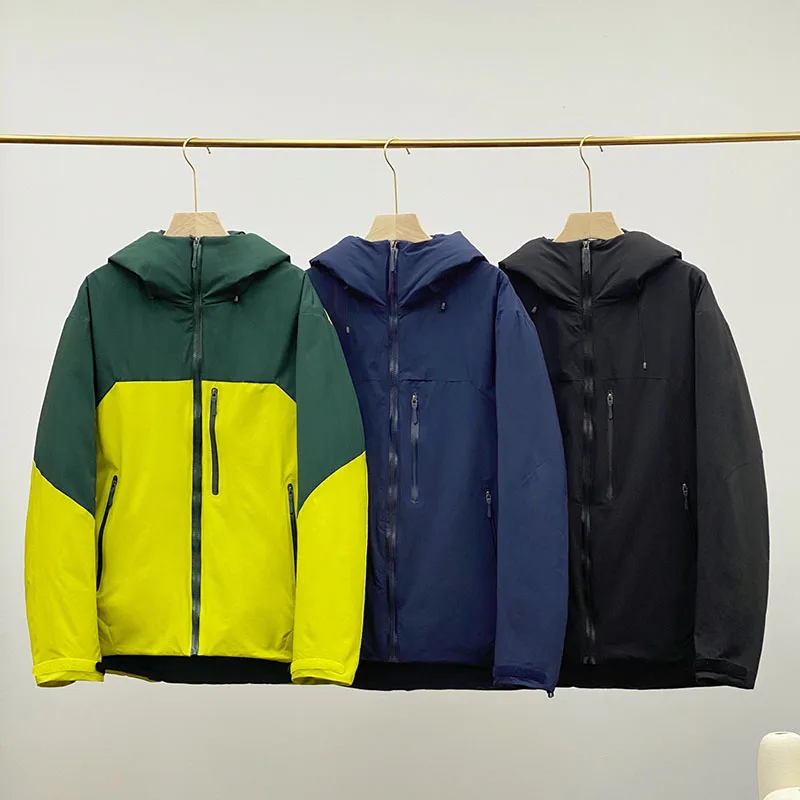 

Высококачественный, модный, крутой и модный уличный двухцветный пуховик с капюшоном, повседневная и универсальная куртка, унисекс.