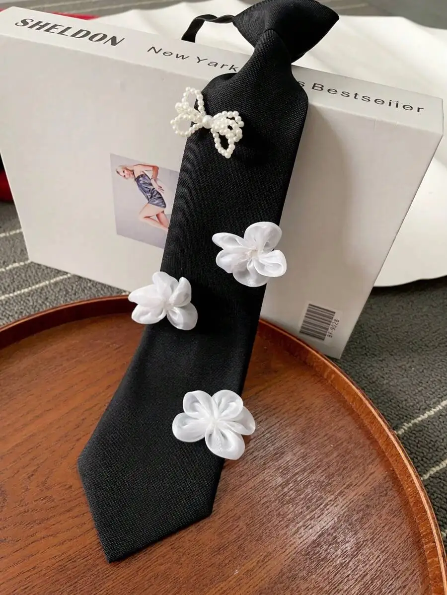 

Black Polyester Neck Tie With White Floral And Faux Pearl Decor For Women