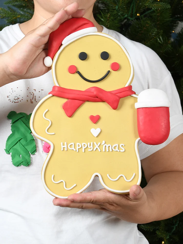 Christmas decorations, gingerbread figurines, hanging ornaments, shooting props