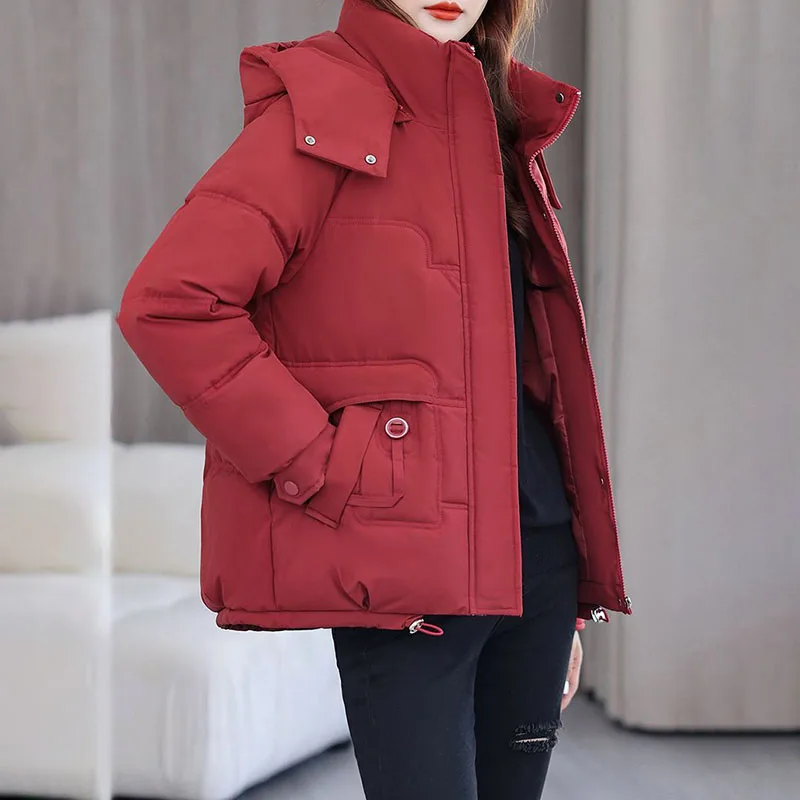 เสื้อแจ็คเก็ตผ้าฝ้ายบุใยสังเคราะห์สไตล์เกาหลีสำหรับผู้หญิง แบบสั้น มีฮู้ดถอดได้ อุ่นสบาย เหมาะสำหรับฤดูใบไม้ร่วงและฤดูหนาว เสื้อคลุมแฟชั่นสำหรับผู้หญิง