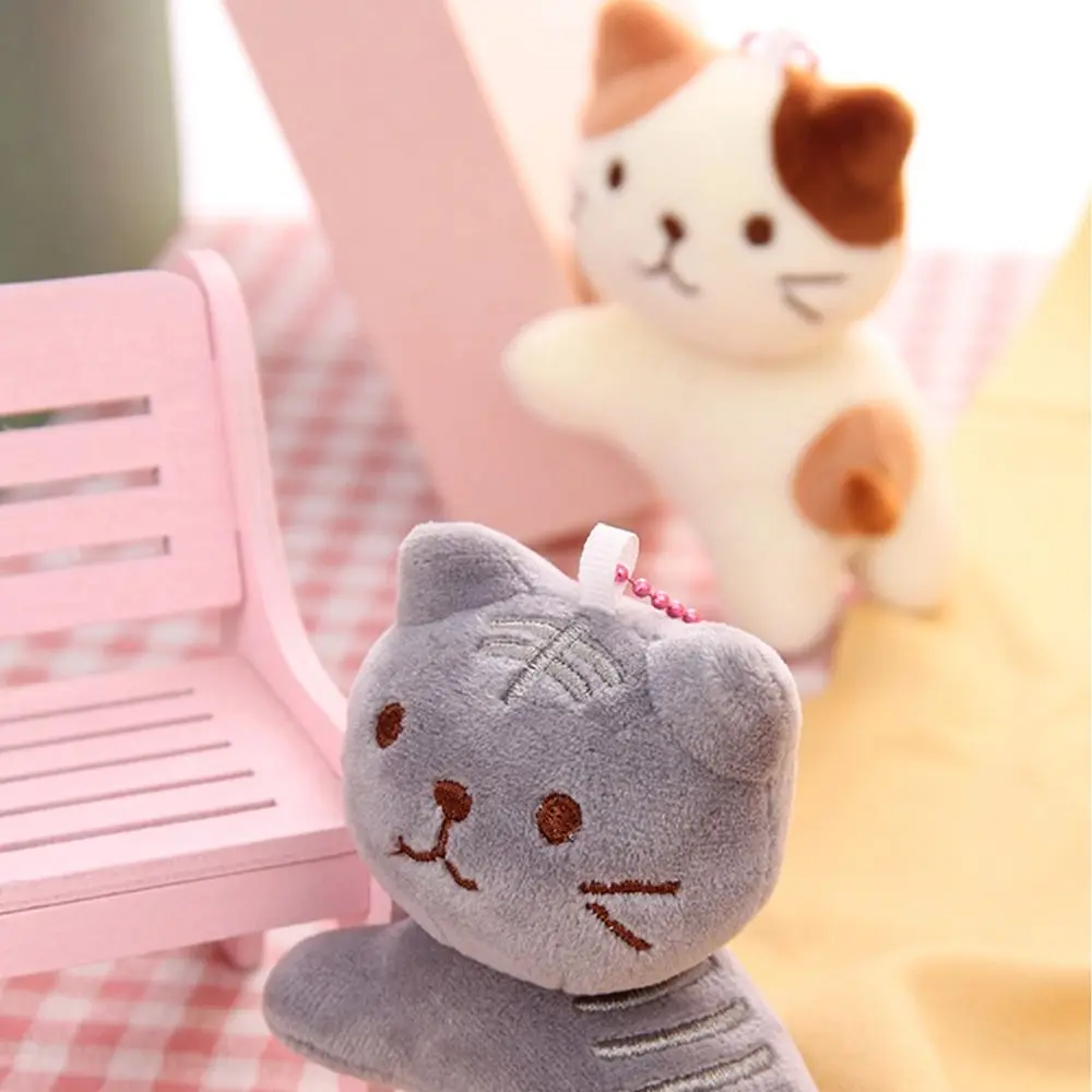Boucle de clé chat mignon en peluche pendentif sac à dos breloques en peluche tête tordue chaton porte-clés Style coréen dessin animé poupée pendentif