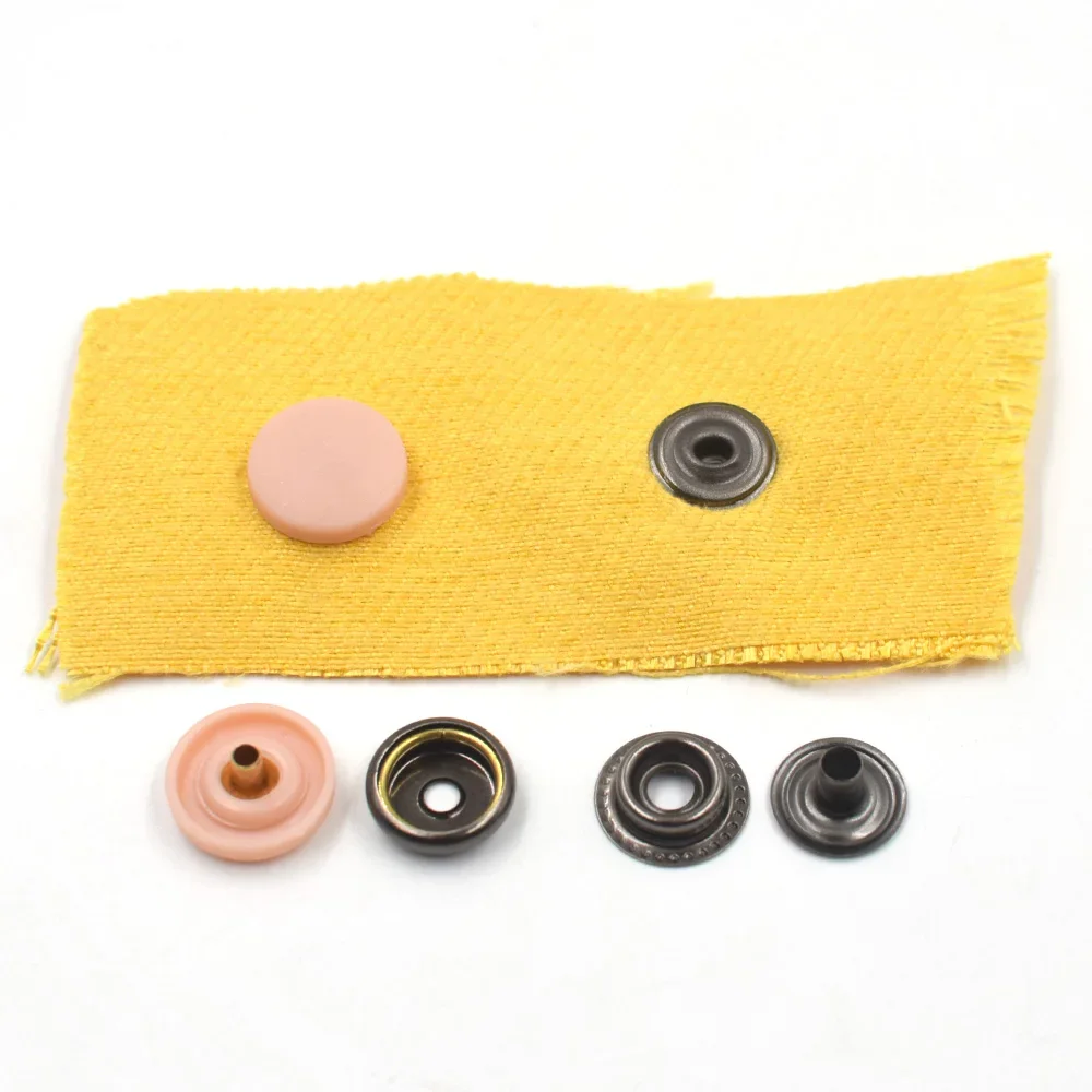20sets buttons with 2 manual tools, fastener hammer sticks,hole puncher,ring Spring type brass snaps,nylon cap,DIY accessories