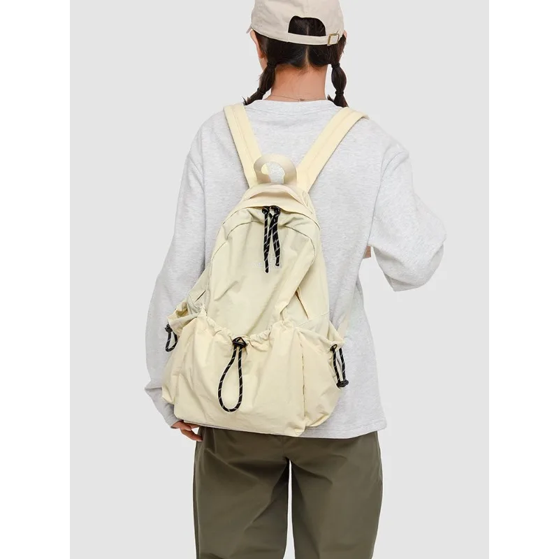 

Large Capacity Solid Nylon Backpack 2025 Hot Selling Air Cushion Strap Soft Casual Backpack Soft Handle Outer Frame School Bags