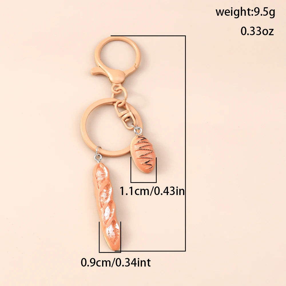 Niedlicher Schlüsselanhänger in Form eines Brotbrotes, Croissant- oder Butterbrot-Designs, für Damen und Herren, als Anhänger für Handtaschen, zum Selbergestalten von Schmuck und zur Dekoration. – Detail 3