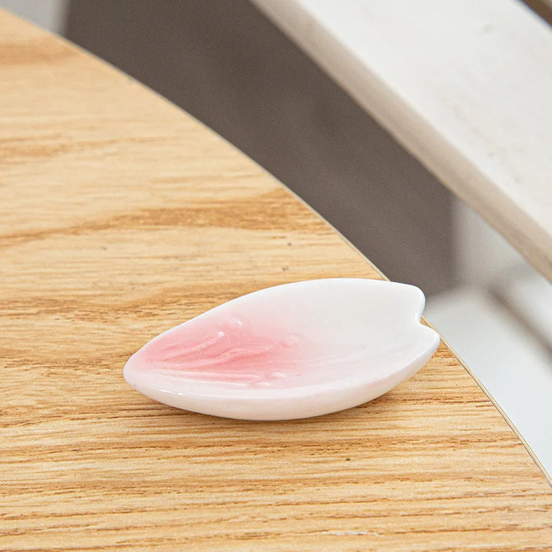 100pcs Creative Chopstick Holder Chopstick Pillow Spoon Holder Cherry Blossom Petal Chopstick Holder Japanese Ceramic Tableware view 3