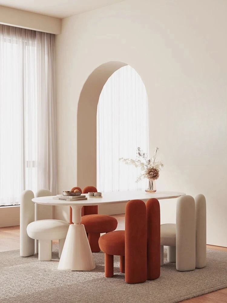 Cream style Internet celebrity dining table and chair combination, designer personality light luxury simple special-shaped
