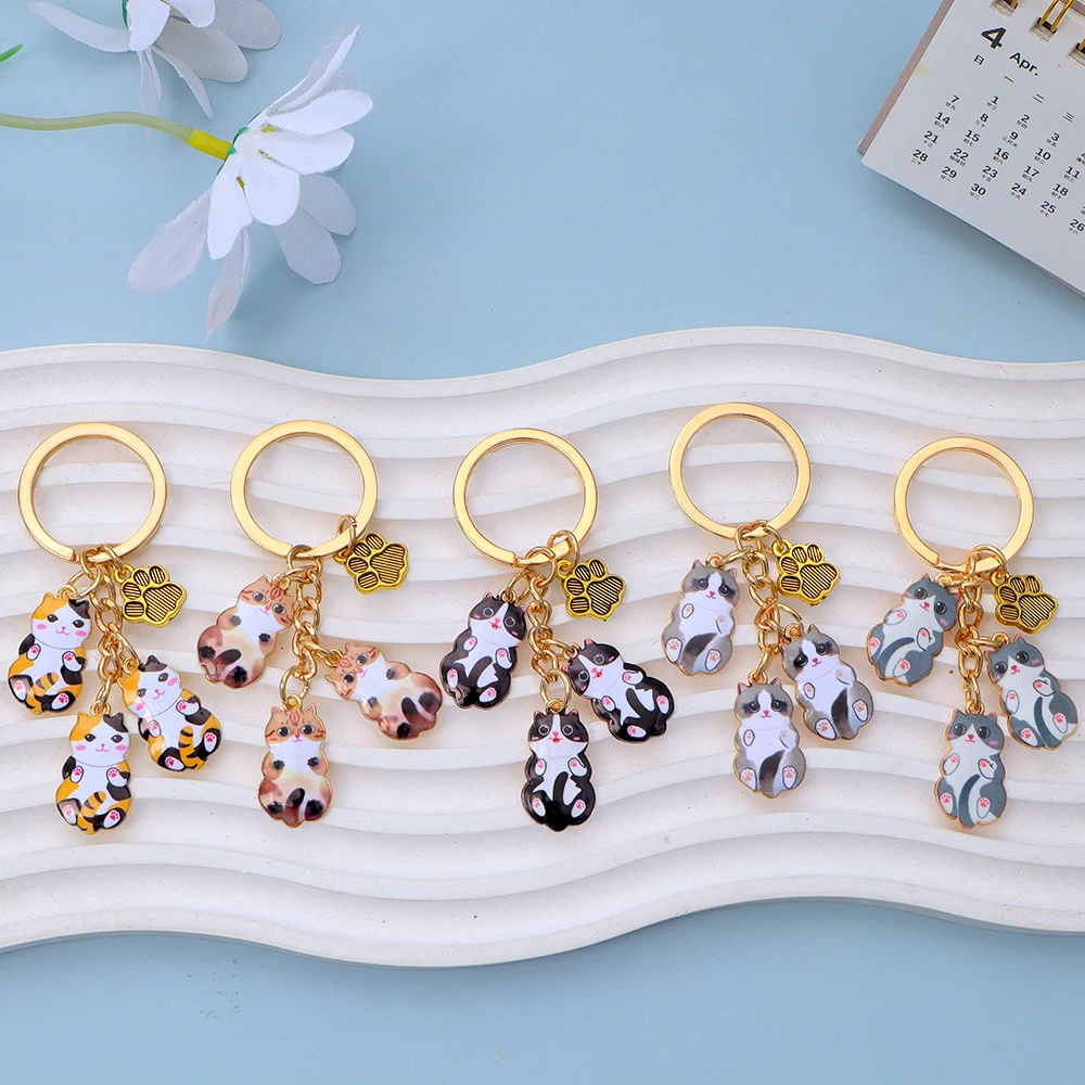 Sevimli Emaye Güzel Kedi Anahtarlıklar Çoklu Evcil Hayvan Hayvanlar Paw Etiketi Charms Anahtarlıklar Kadın Erkek Çanta Süsler Araba Biblo Takı
