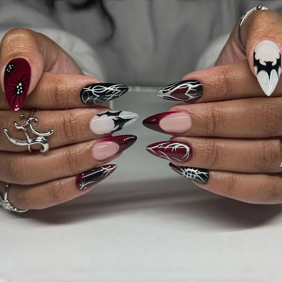 

24PCS Punk Red Almond Stick on Nails Black Gradient with Metallic Silver Bat Spider Patterns French Fake Nails Almond False Nail