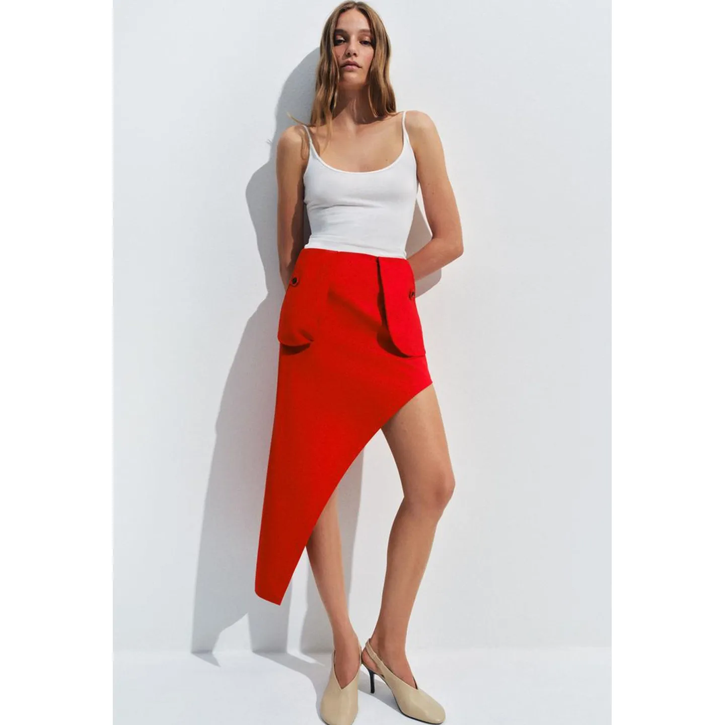 Summer New Women's Zipper Asymmetric Hem Pocket Decorated Midi Skirt mid Waist Non Symmetrical Fashion Trend Polyester Fiber