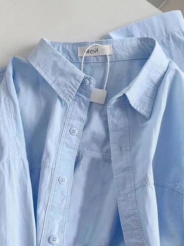 Camisa de algodón puro azul de lujo claro para mujer, ropa de abrigo de protección solar de manga larga, nueva chaqueta elegante y holgada 2025