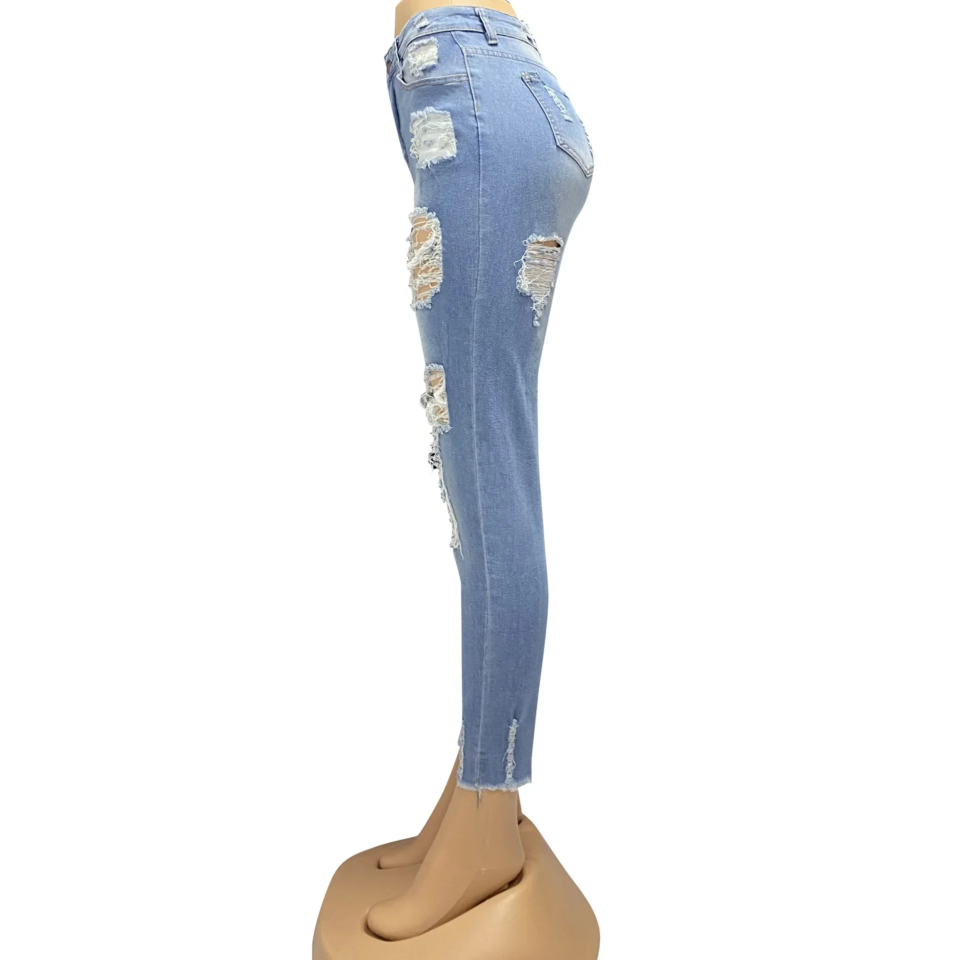 Jeans con fori in Denim da donna che lavano pantaloni a matita con cerniera a vita alta tasche Slim Fit a figura intera primavera 2024 Streetwear