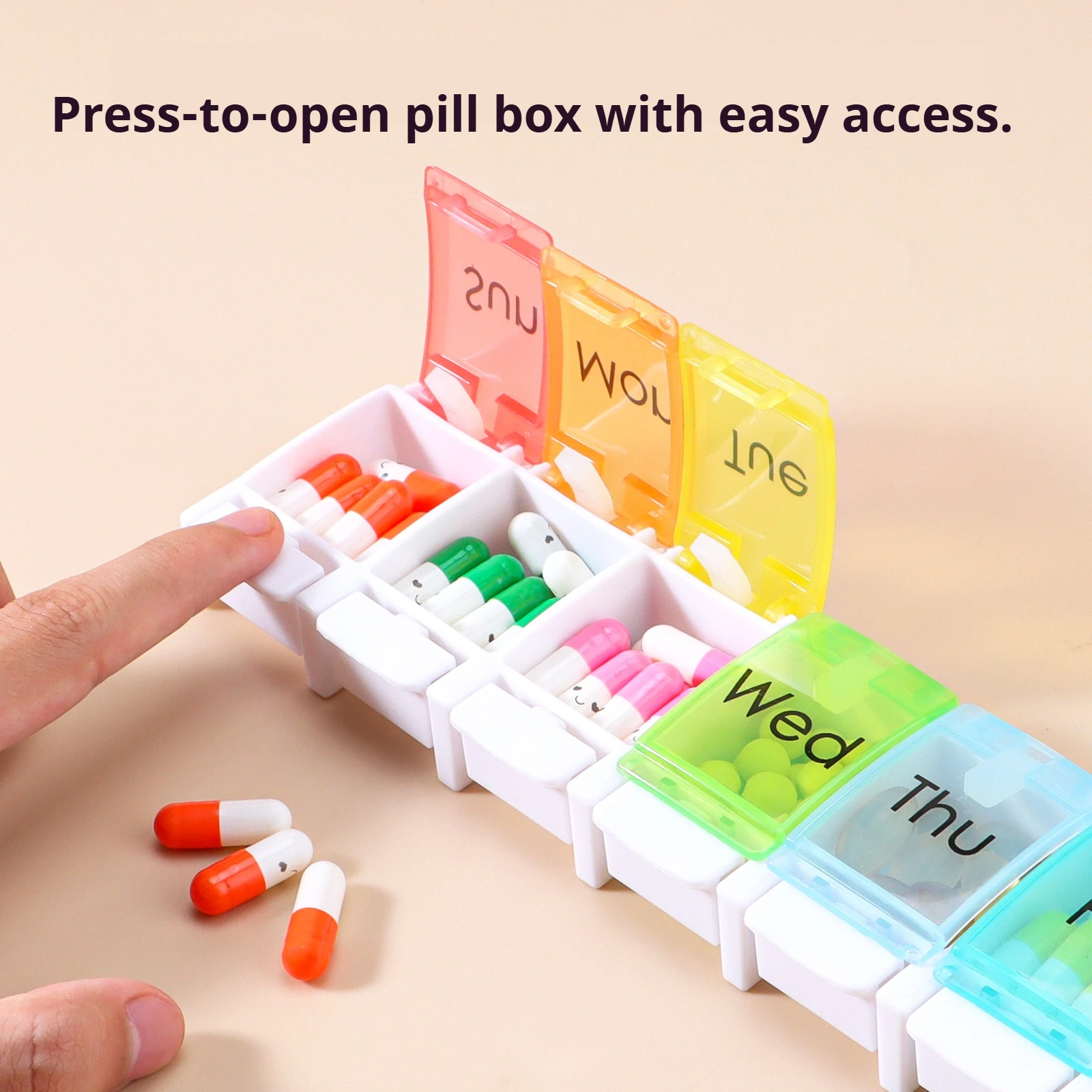 

Weekly Pill OrganizerRainbow Bounce Button Medicine Box Travel 7 Day Pill Box Case with Spring Open Design and Large Compartment