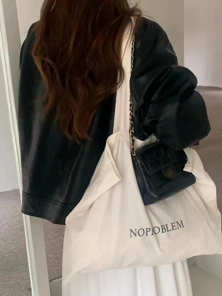 جاكيت جلدي أنيق للنساء بياقة كلاسيكية وتصميم فضفاض متعدد الاستخدامات على طراز الدراجات النارية، إصدار جديد لربيع 2024