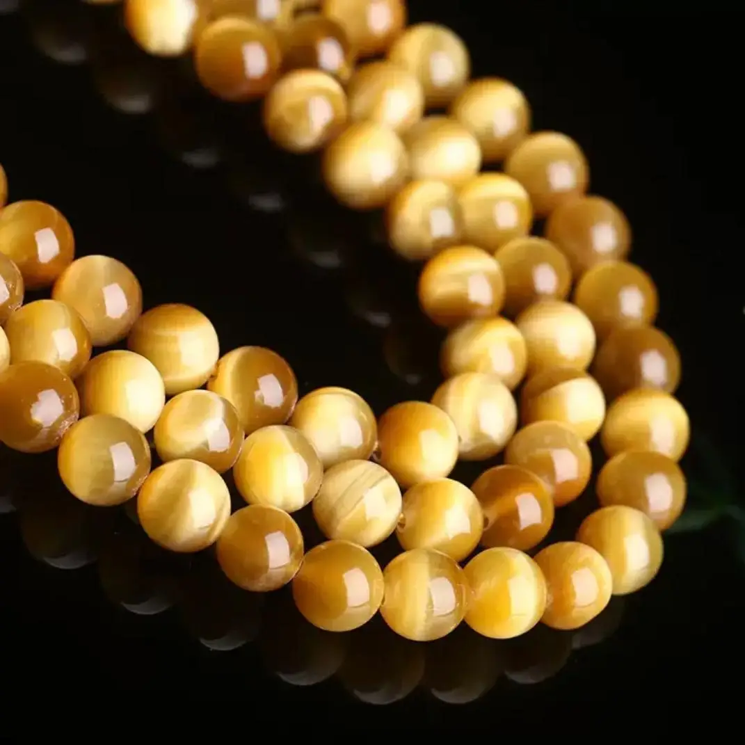 Natural golden tiger's eye loose beads, round beads, beaded bracelets, necklaces, and car ornaments for men and women.
