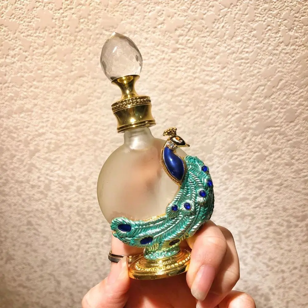 

Strong sealing Peacock Cosmetics Container Celebration bottle Arabian Style Essential Oil Bottle Refillable bottle