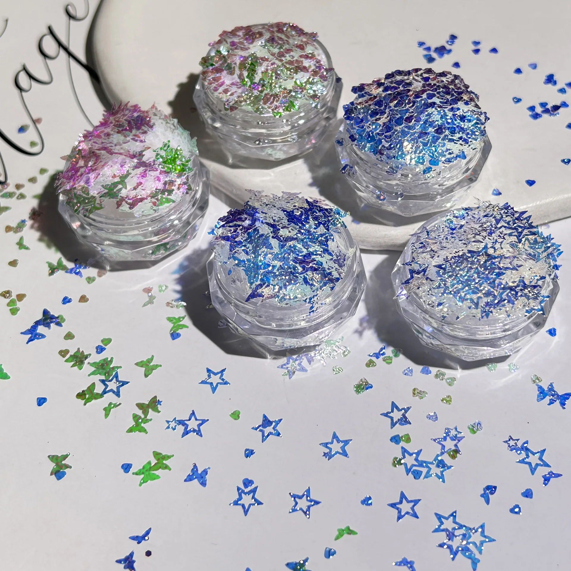 Nuovo scintillante blu glitter per unghie in rilievo farfalla sottile piccolo cuore stella cava Aurora rosa accessori per unghie decorazione fai da te